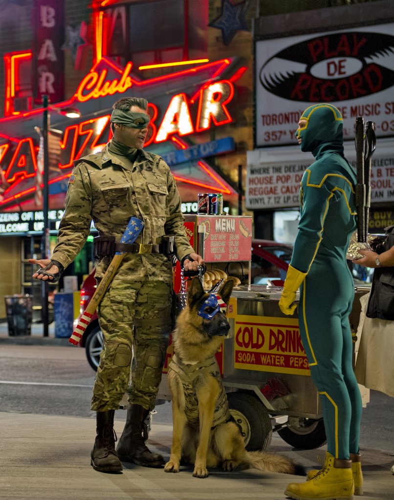 Jim Carrey, left, and Aaron Taylor-Johnson in a scene from the movie Kick-Ass 2. Jim Carrey, left, and Aaron Taylor-Johnson in a scene from the movie Kick-Ass 2.