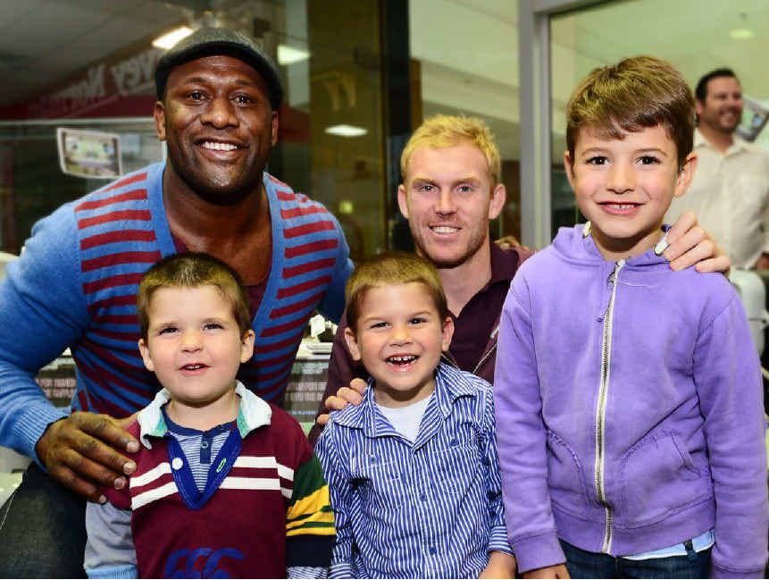 GROWING FANS: Former Broncos player Wendell Sailor and current player Peter Wallace enjoy a fan meeting organised by Harvey Norman Ipswich. Young fans (from left) are Archie, Charlie, and Harrison Jensen, of Laidley. GROWING FANS: Former Broncos player Wendell Sailor and current player Peter Wallace enjoy a fan meeting organised by Harvey Norman Ipswich. Young fans (from left) are Archie, Charlie, and Harrison Jensen, of Laidley.