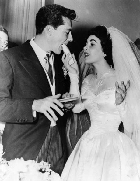 US film star Elizabeth Taylor and her first husband Nick Hilton, of the hotelier family, on their wedding day.
US film star Elizabeth Taylor and her first husband Nick Hilton, of the hotelier family, on their wedding day.