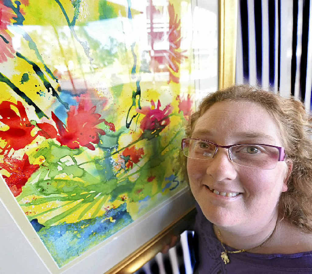 CREATIVE STREAK: Stephanie Robson suffers from cerebral palsy but art has opened up a new world to her. CREATIVE STREAK: Stephanie Robson suffers from cerebral palsy but art has opened up a new world to her.