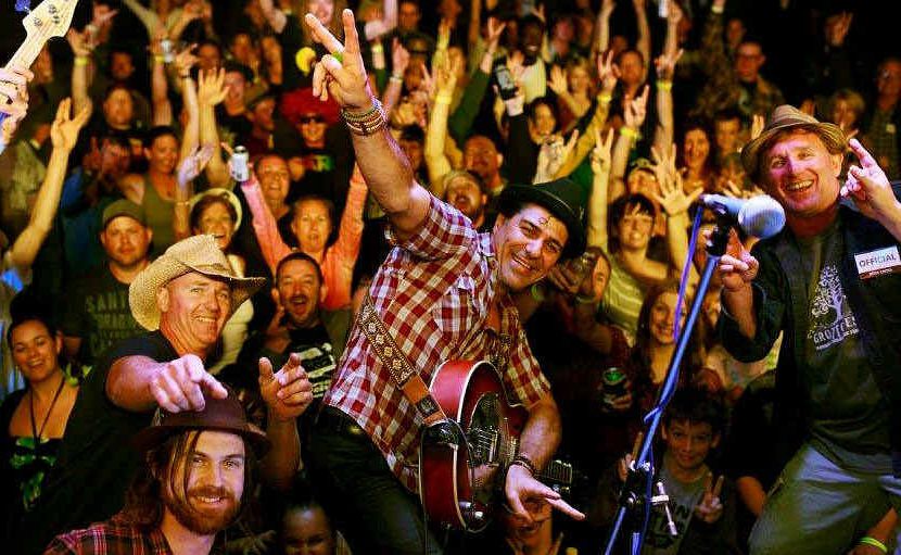 Artist Nicky Bomba (second from right) and loyal festival-goers let loose at Grotto Fest 2012. Artist Nicky Bomba (second from right) and loyal festival-goers let loose at Grotto Fest 2012.