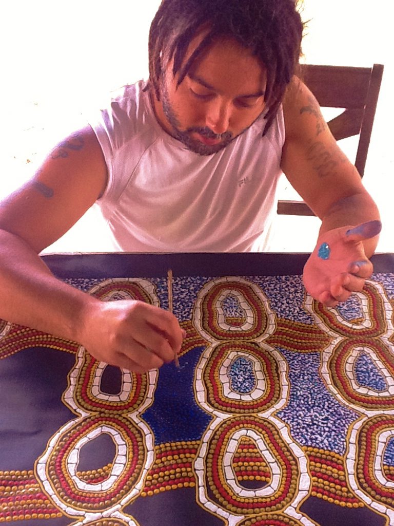 Bundjalung Kunjiel manager and performer Stephen Larcombe works on his artwork. Bundjalung Kunjiel manager and performer Stephen Larcombe works on his artwork.