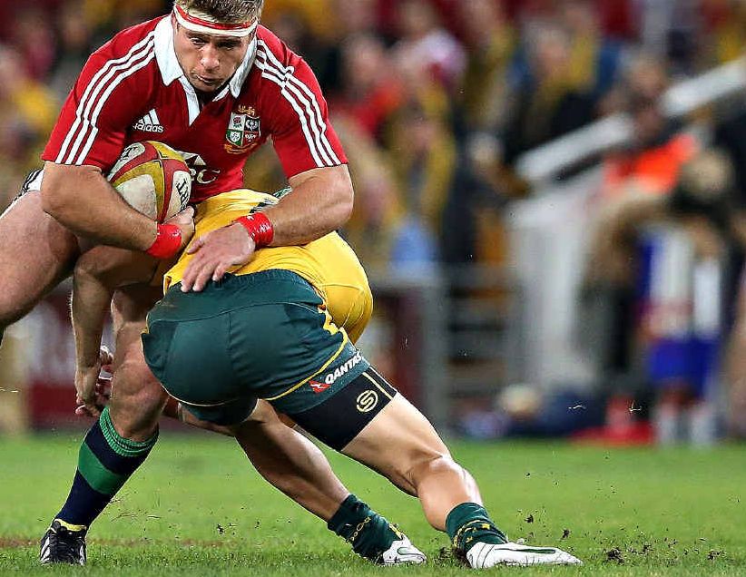 British and Irish Lions hooker Tom Youngs is stopped in his tracks by Australia’s Berrick Barnes at Brisbane’s Suncorp Stadium on June 22. British and Irish Lions hooker Tom Youngs is stopped in his tracks by Australia’s Berrick Barnes at Brisbane’s Suncorp Stadium on June 22.