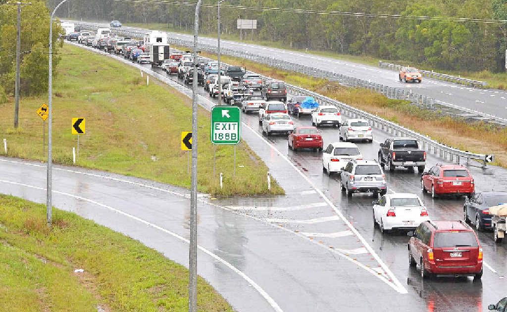 Traffic heading south queues on the Bruce at the Caloundra exit. Traffic heading south queues on the Bruce at the Caloundra exit.