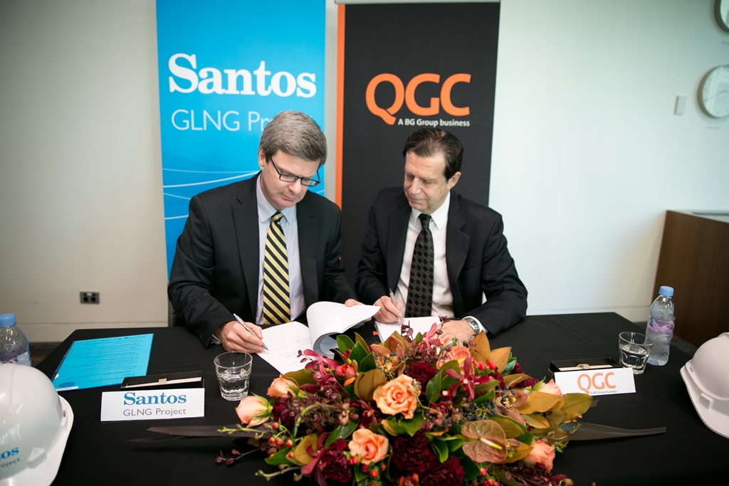 Santos Vice President GLNG Downstream Rod Duke (left) and QGC's Derek Fisher sign an agreement to link pipelines on Curtis Island. Santos Vice President GLNG Downstream Rod Duke (left) and QGC's Derek Fisher sign an agreement to link pipelines on Curtis Island.