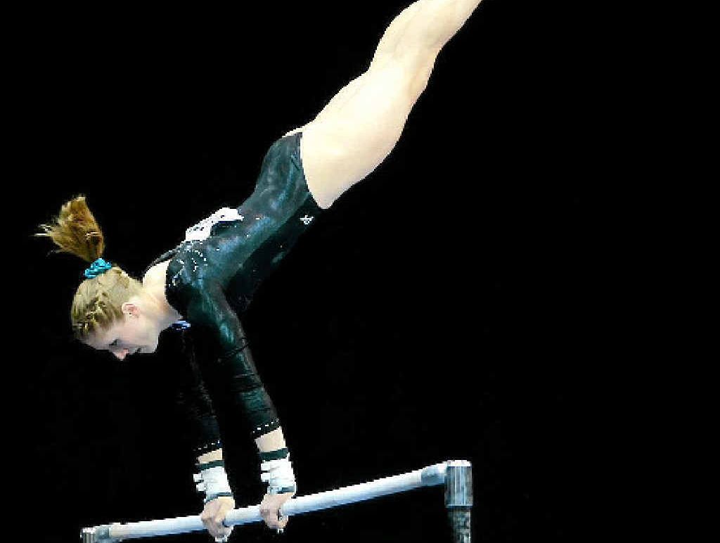 ON THE WAY TO A WIN: Australian gymnast Olivia Vivian competes on the uneven bars at last year’s Australian Gymnastics Championships in Sydney. ON THE WAY TO A WIN: Australian gymnast Olivia Vivian competes on the uneven bars at last year’s Australian Gymnastics Championships in Sydney.