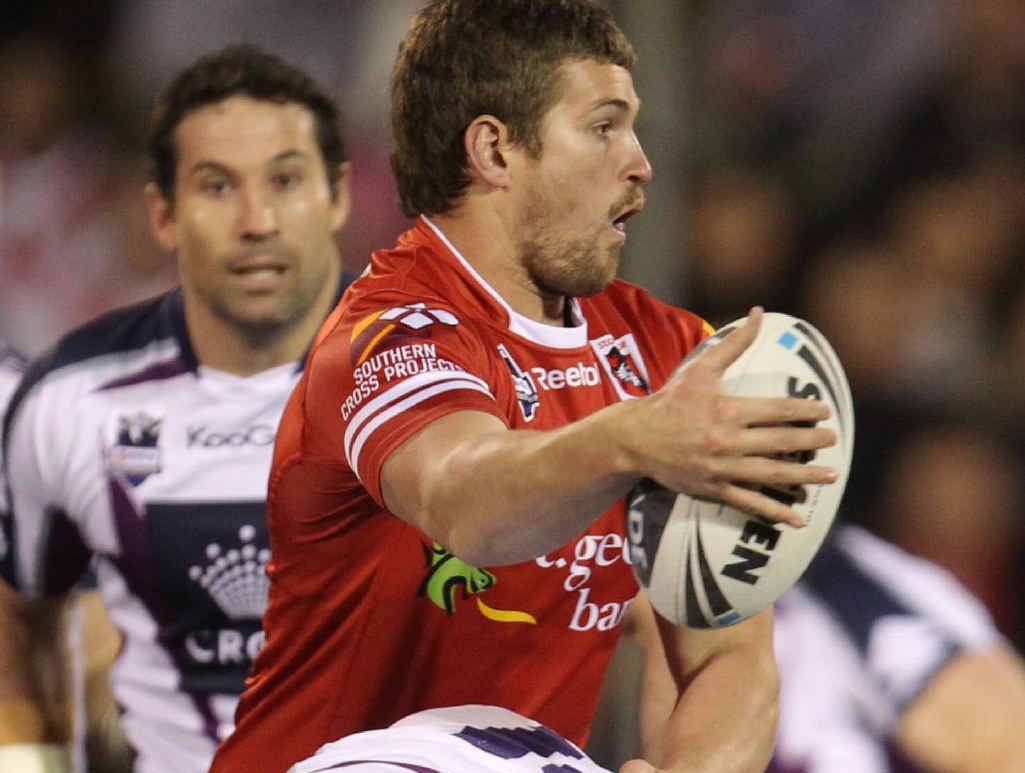 LAST SEASON: The Dragons’ Will Matthews manages to offload as the Storm closes in. LAST SEASON: The Dragons’ Will Matthews manages to offload as the Storm closes in.