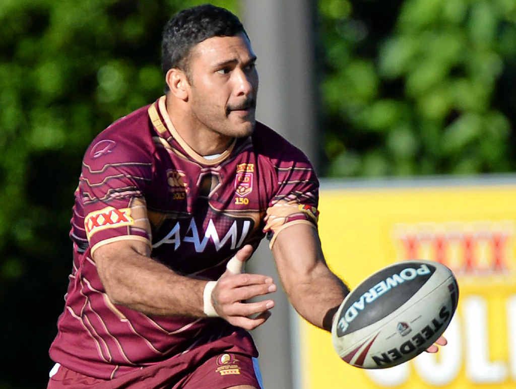BUSINESS AS USUAL: Justin Hodges offloads during a Queensland training session at Coolum yesterday. BUSINESS AS USUAL: Justin Hodges offloads during a Queensland training session at Coolum yesterday.