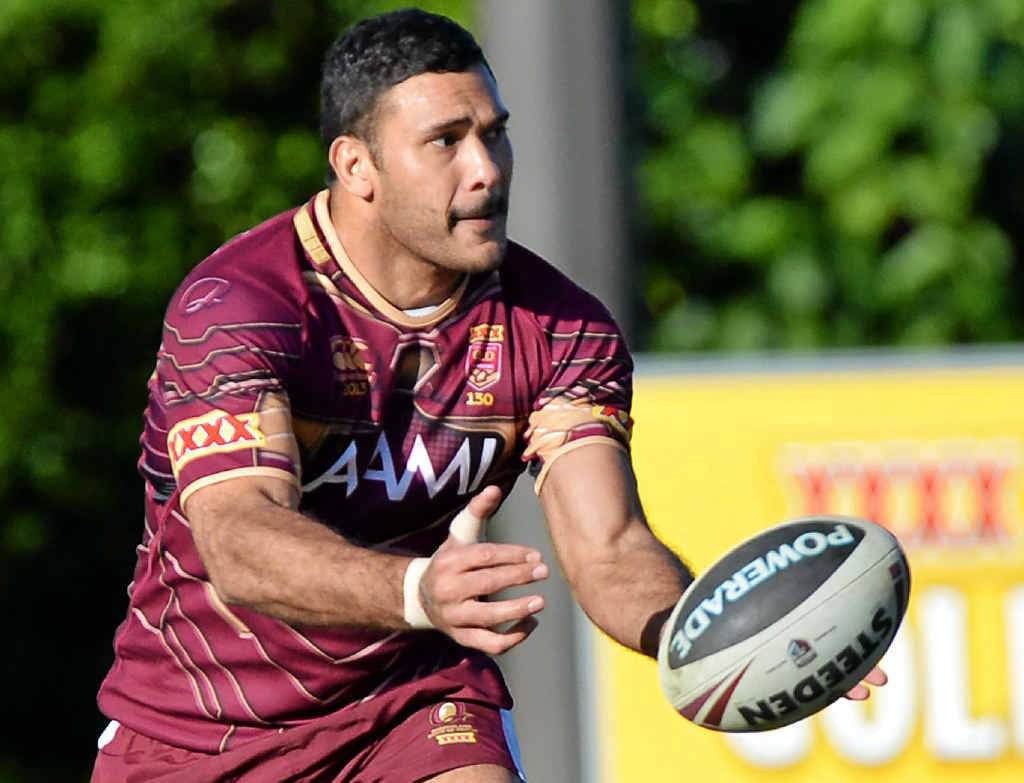 BUSINESS AS USUAL: Justin Hodges offloads during a Queensland training session at Coolum yesterday. BUSINESS AS USUAL: Justin Hodges offloads during a Queensland training session at Coolum yesterday.