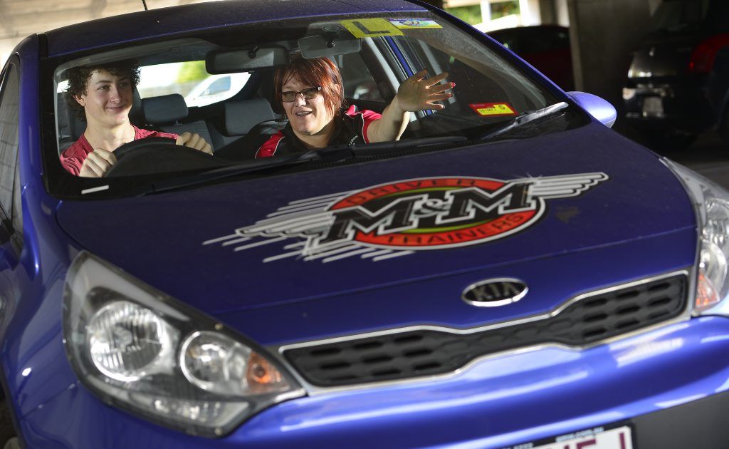 M&M; Driving instructor Melissa Mayers sees kids with bad driving habits passed on by their parents every day. She's with learner driver Brent Kropp, 17. M&M; Driving instructor Melissa Mayers sees kids with bad driving habits passed on by their parents every day. She's with learner driver Brent Kropp, 17.