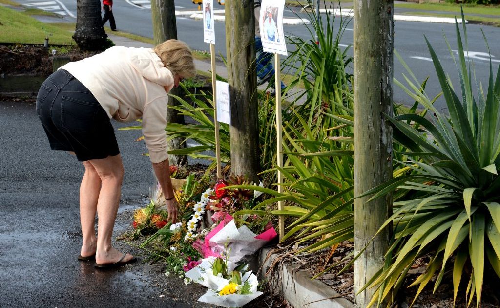People laying wreaths for Kelvin Kane in the carpark Kingscliff. People laying wreaths for Kelvin Kane in the carpark Kingscliff.