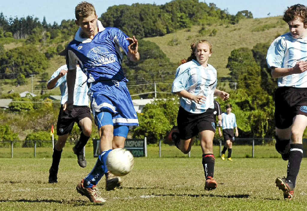 PLAY ON: Jacob Graham unleashes a shot at goal during action at Lismore Thistles’ repaired turf. PLAY ON: Jacob Graham unleashes a shot at goal during action at Lismore Thistles’ repaired turf.