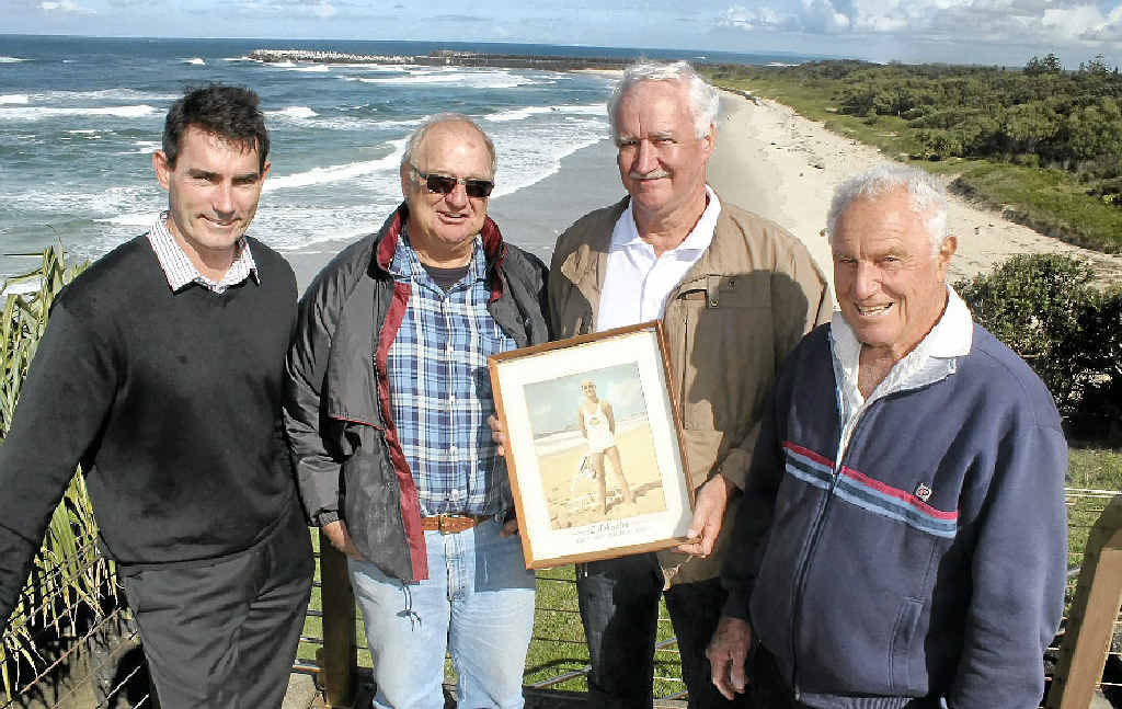 MEMORIES: Captain of the Ballina Lighthouse and Lismore Surf Life Saving Club Andrew Dougherty with veteran lifesavers Richard Crandon, Eoin Johnston and Jack Trevan. Mr Johnston is holding a picture of himself taken in the early 1960s. MEMORIES: Captain of the Ballina Lighthouse and Lismore Surf Life Saving Club Andrew Dougherty with veteran lifesavers Richard Crandon, Eoin Johnston and Jack Trevan. Mr Johnston is holding a picture of himself taken in the early 1960s.