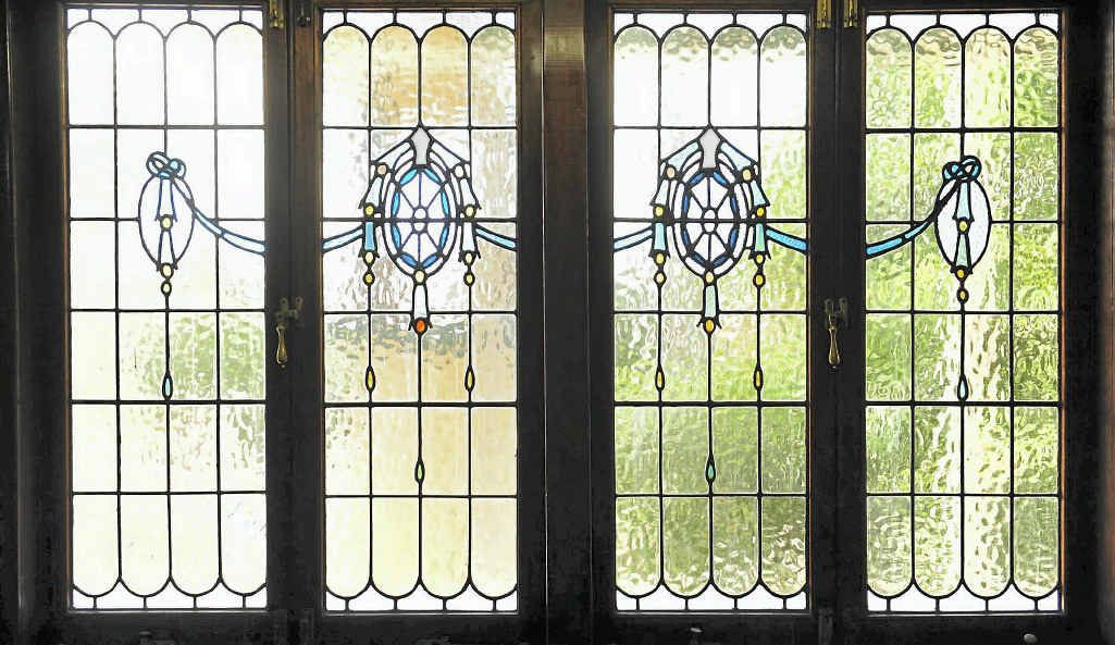 Leadlight windows open the front parlour up to the world. Leadlight windows open the front parlour up to the world.