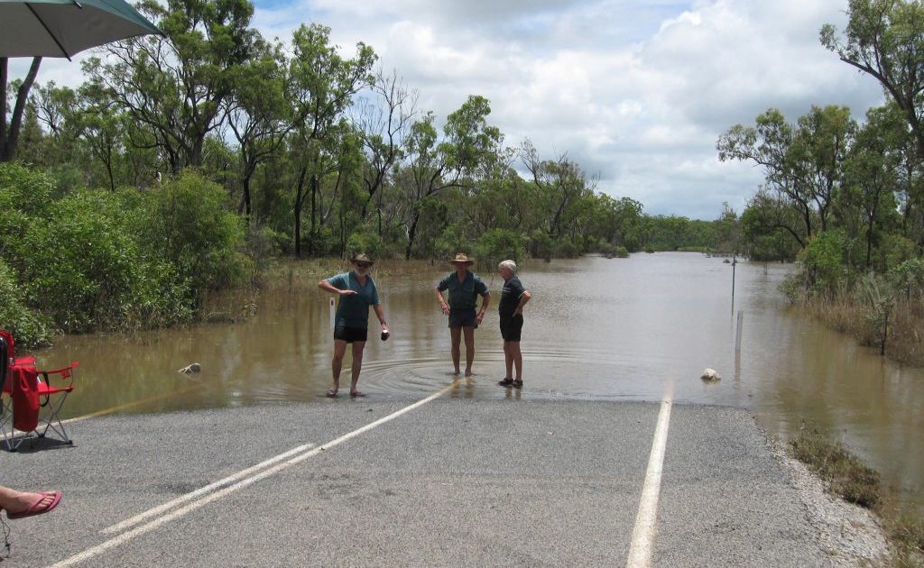 THE GREAT DIVIDE: From left -Boyne Valley residents Frank McKee, Neville Mossman and Jim Brodie discuss the flooded Monto Road that cut them off from access to Calliope for nearly 10 days. Pic supplied THE GREAT DIVIDE: From left -Boyne Valley residents Frank McKee, Neville Mossman and Jim Brodie discuss the flooded Monto Road that cut them off from access to Calliope for nearly 10 days. Pic supplied