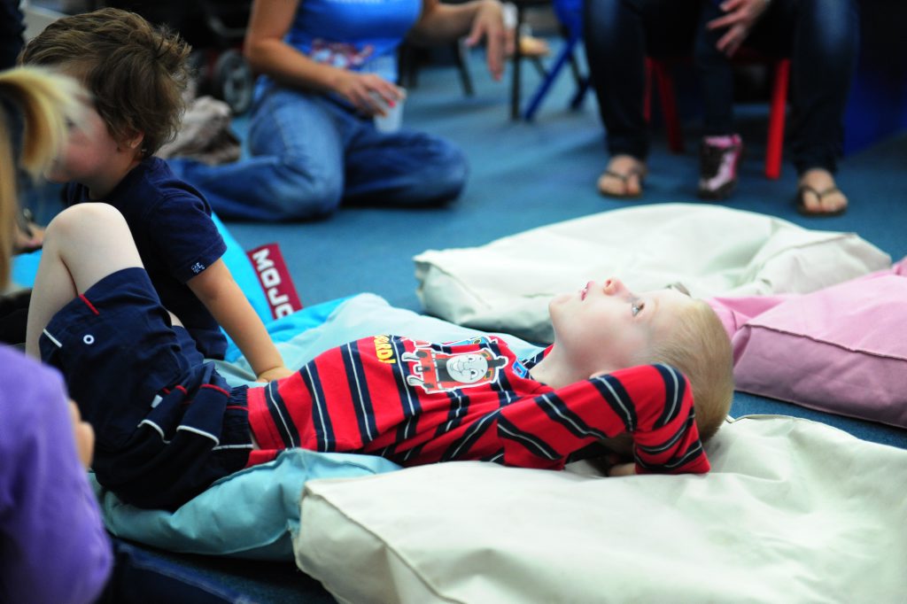 Connor Elcoate, 3, attending a book reading and activities at Calliope Library.