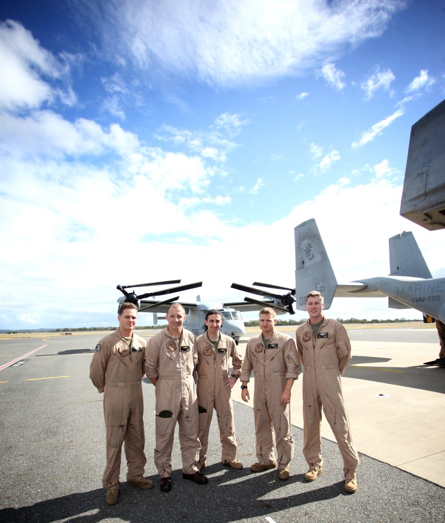 USMC's SGT J.J. Schneider, CAPT C.R. Sherwood, CAPT C.A. Goodman, CAPT J.E. Carpenter and CAPT T.E. Keeney at Rockhampton Airport with two V-22 Ospreys. Photo Allan Reinikka / The Morning Bulletin USMC's SGT J.J. Schneider, CAPT C.R. Sherwood, CAPT C.A. Goodman, CAPT J.E. Carpenter and CAPT T.E. Keeney at Rockhampton Airport with two V-22 Ospreys. Photo Allan Reinikka / The Morning Bulletin