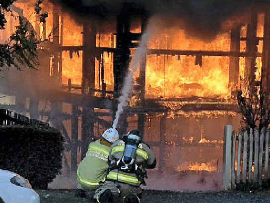 WARNING: Firefighters claim responses to fires, such as this one in Thorn St last month, will be slowed by the closure of the Limestone St station. WARNING: Firefighters claim responses to fires, such as this one in Thorn St last month, will be slowed by the closure of the Limestone St station.