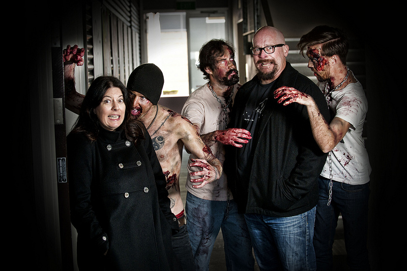QUT academics Dr Debra Polson and Dr Tim Milfull are running a public zombie research seminar about the continued popularity of zombies in pop culture. Also pictured from left to right are zombies Darryl Burns, Chris Earl and Andrew Watt. QUT academics Dr Debra Polson and Dr Tim Milfull are running a public zombie research seminar about the continued popularity of zombies in pop culture. Also pictured from left to right are zombies Darryl Burns, Chris Earl and Andrew Watt.