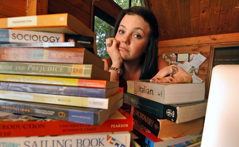 Yandina's Peta Wicks finds it hard juggling her university studies at USC with paid work at IGA supermarket. Yandina's Peta Wicks finds it hard juggling her university studies at USC with paid work at IGA supermarket.