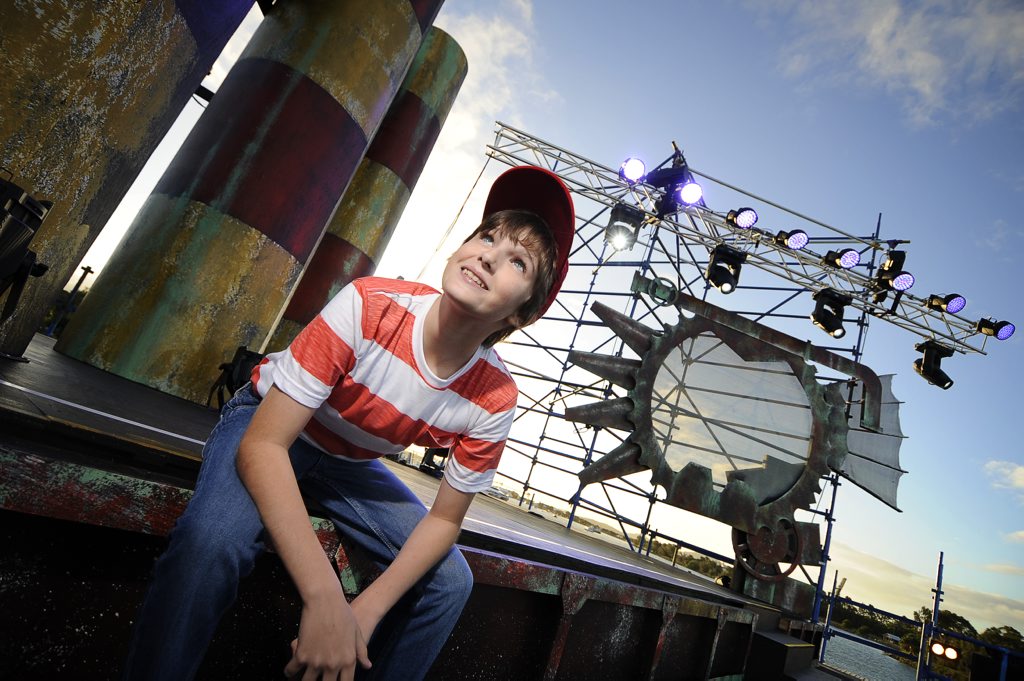 Boomtown star George Cartwright, 13, on set at the Gladstone Marina. Boomtown star George Cartwright, 13, on set at the Gladstone Marina.