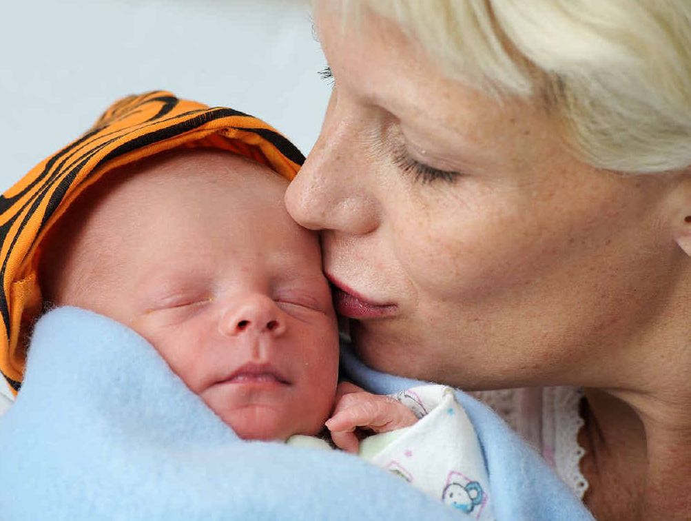 LIGHTNING BOY BENJI: Lynda Sika gives her new baby Benji a kiss at the Ipswich Hospital yesterday. LIGHTNING BOY BENJI: Lynda Sika gives her new baby Benji a kiss at the Ipswich Hospital yesterday.