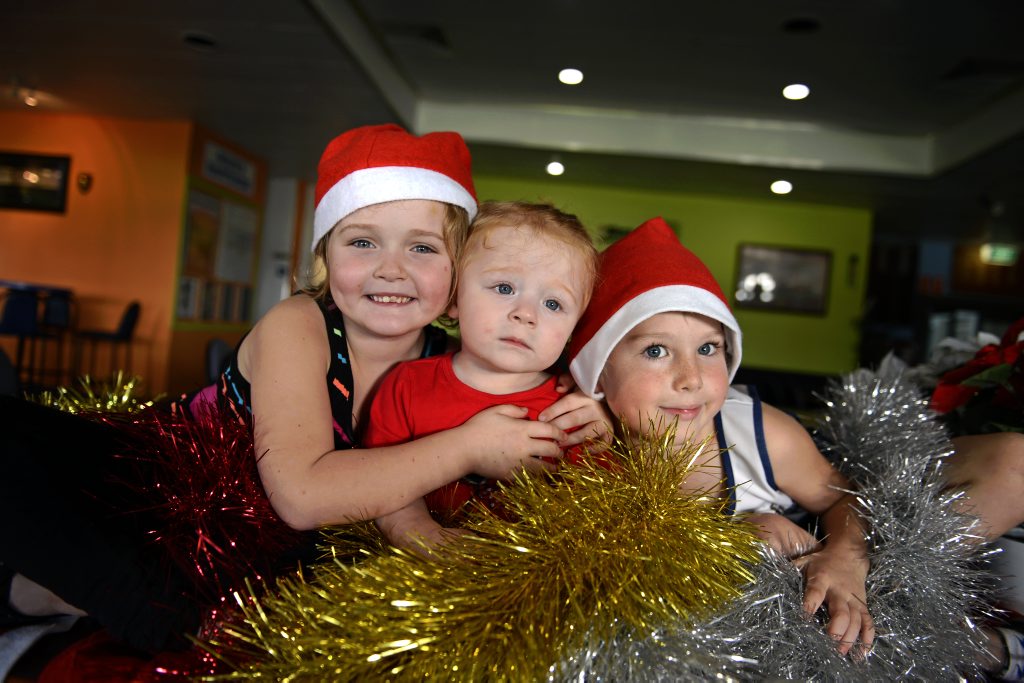 Mia Anderson, Rosa Philips and Cohan Warren at Kirra Sports Club for Xmas in July. Mia Anderson, Rosa Philips and Cohan Warren at Kirra Sports Club for Xmas in July.