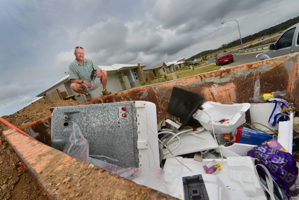 John O'Sullivan from Absolute Homes is mad about people dumping rubbish on his building sites in Gladstone. John O'Sullivan from Absolute Homes is mad about people dumping rubbish on his building sites in Gladstone.