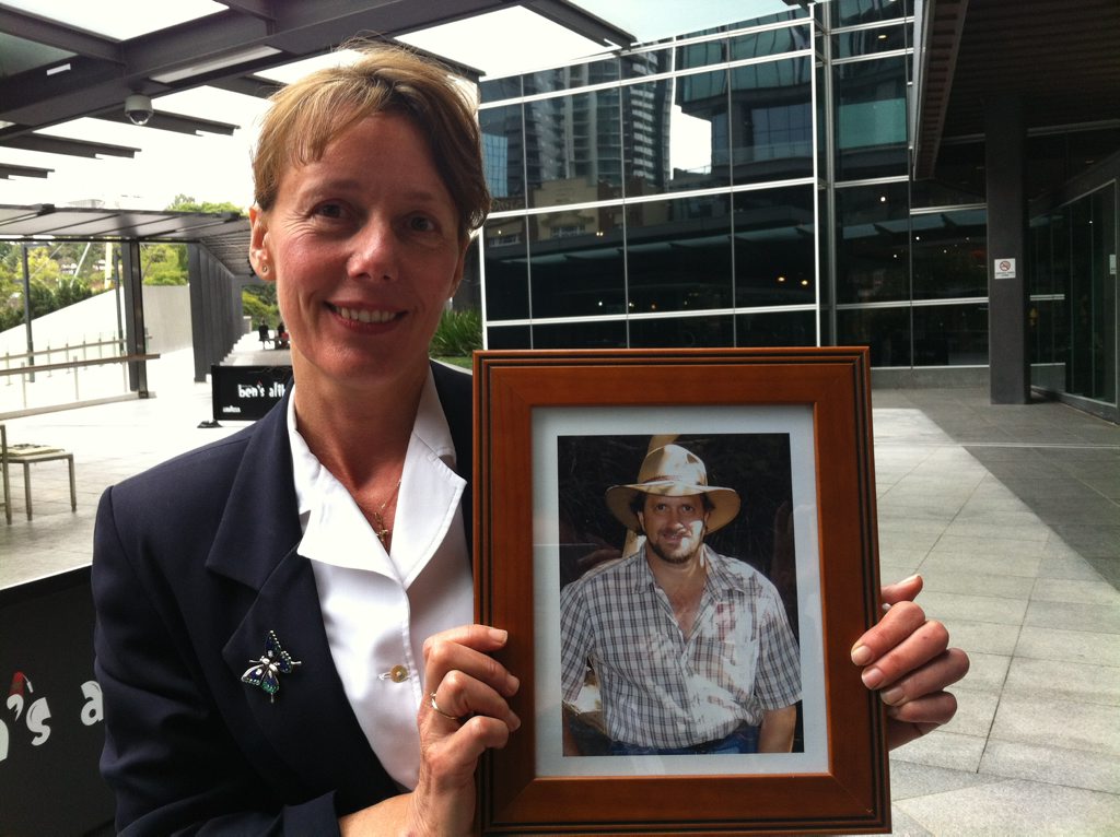 Wamuran's Andrea Mafliet, guidance officer at Woodford, with a photo of her partner Gavin Woods, who was deputy principal at Burpengary State School before taking his own life. Wamuran's Andrea Mafliet, guidance officer at Woodford, with a photo of her partner Gavin Woods, who was deputy principal at Burpengary State School before taking his own life.