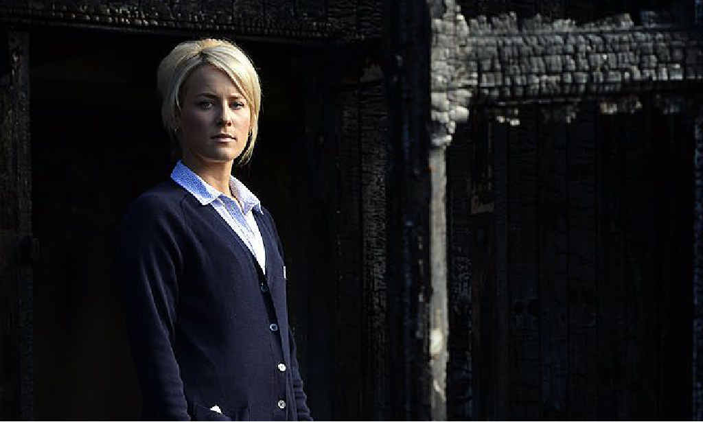 ALL GONE: Emily Moreton stands in the charred skeleton of her Thorn St home. The house burnt down in a dramatic blaze in June. ALL GONE: Emily Moreton stands in the charred skeleton of her Thorn St home. The house burnt down in a dramatic blaze in June.