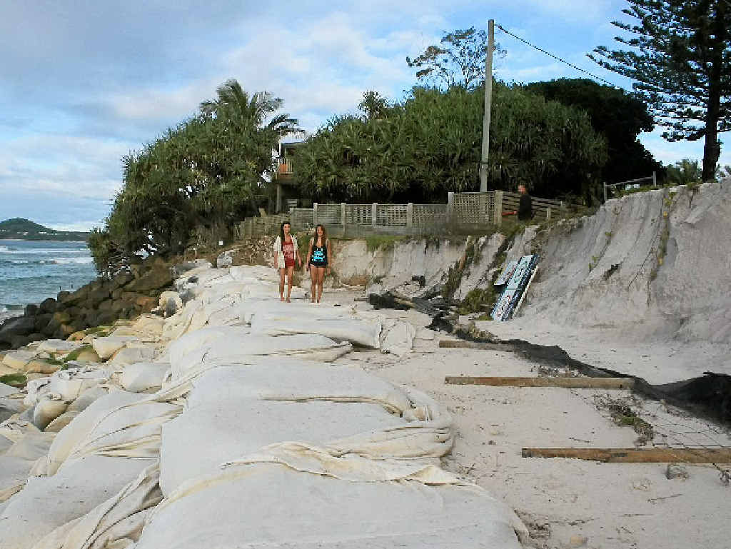RISING TIDE: Belongil Beach shows the scars from a super moon tides, the type of event from which waterside landowners want to protect themselves. RISING TIDE: Belongil Beach shows the scars from a super moon tides, the type of event from which waterside landowners want to protect themselves.