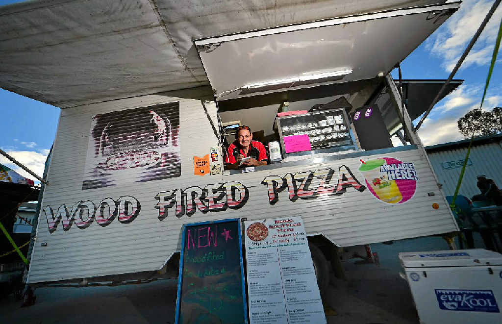 FIRED UP: Anthony Byers, a local business owner for Tiny’s Woodfired Pizza, is busy with business in Gladstone. FIRED UP: Anthony Byers, a local business owner for Tiny’s Woodfired Pizza, is busy with business in Gladstone.
