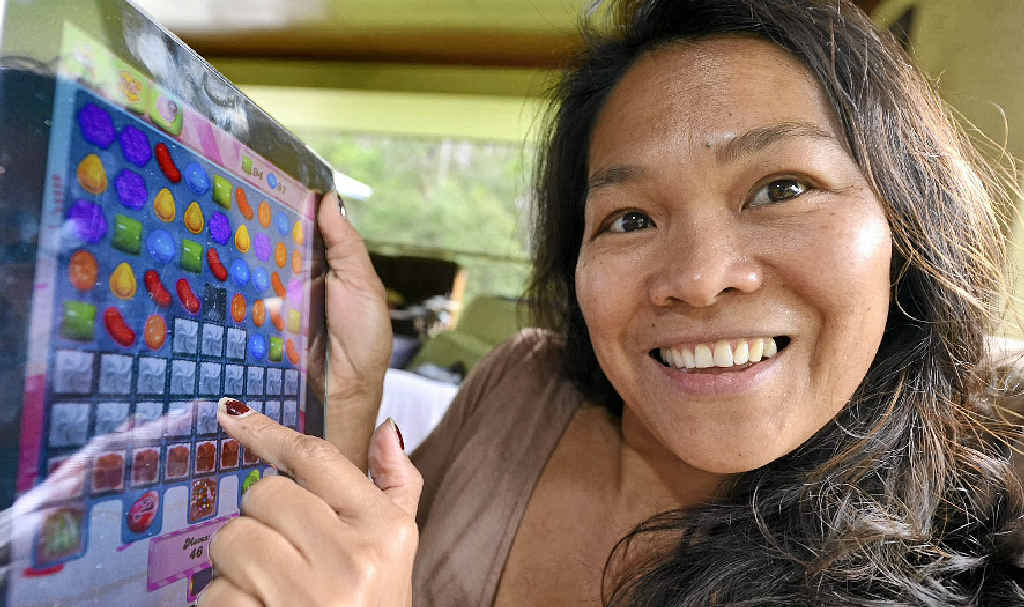 MUM’S IN CHARGE: Elena Dawson just loves her iPad for video games, much to the chagrin of her kids. MUM’S IN CHARGE: Elena Dawson just loves her iPad for video games, much to the chagrin of her kids.