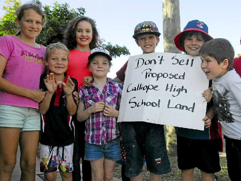 Children join in a march protesting the State Government’s decision to sell off a block of land earmarked for the development of a new high school at Calliope. Children join in a march protesting the State Government’s decision to sell off a block of land earmarked for the development of a new high school at Calliope.