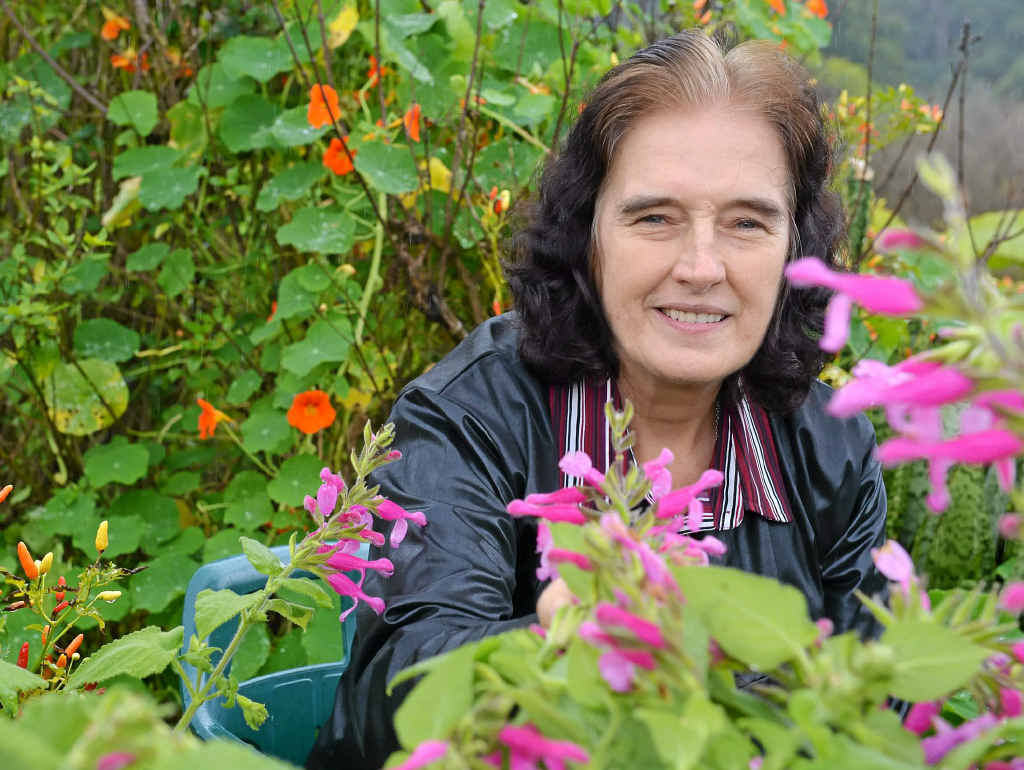 Author Isabell Shipard among her herbs. Author Isabell Shipard among her herbs.