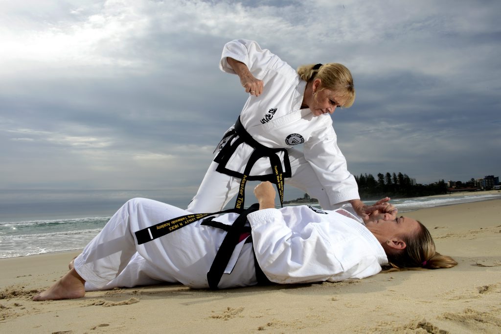 Tina Johnson with Jacqui Ryan of Shim Jang Tae kwon do on Coolangatta Beach. Tina Johnson with Jacqui Ryan of Shim Jang Tae kwon do on Coolangatta Beach.