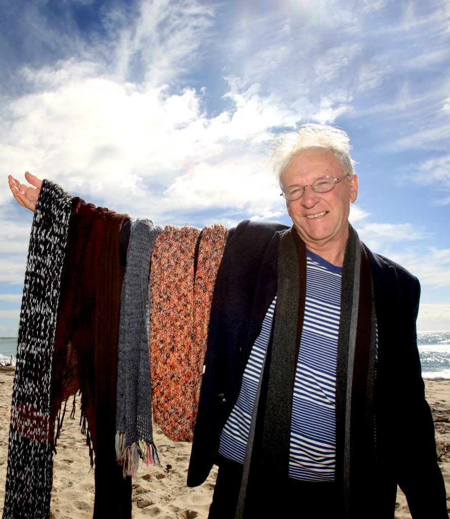 Tweed Shire Mayor Barry Longland with his selection of scarves. 
