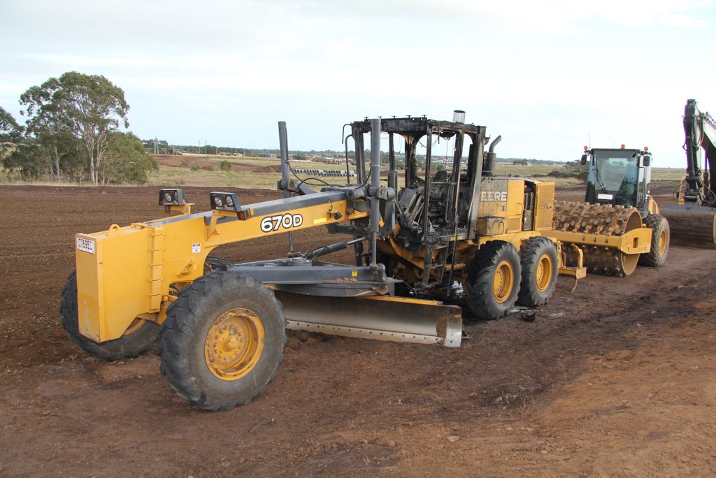 The cabin of this grader in Kawungan was set alight between July 27 and 28. The cabin of this grader in Kawungan was set alight between July 27 and 28.