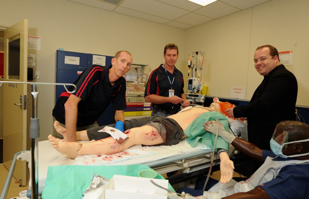 Simulation co-ordinator Steven Schofield and simulator educator Ken Karrasch conduct a demonstration for director of Simulation Clinical Skills Development Centre Dylan Campher.