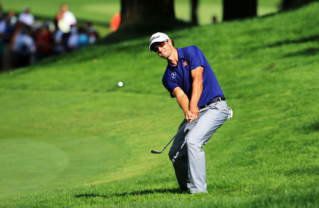 Adam Scott of Australia chips to the 13th green during the final round of the 95th PGA Championship Adam Scott of Australia chips to the 13th green during the final round of the 95th PGA Championship