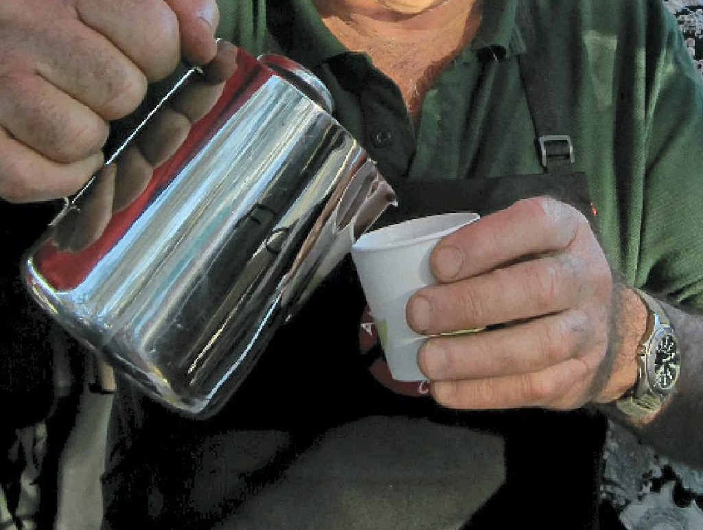 SATISFYING: President of the Australian Subtropical Coffee Association Jos Webber at the From Plant to Cup event at Byron Farmers’ Market. SATISFYING: President of the Australian Subtropical Coffee Association Jos Webber at the From Plant to Cup event at Byron Farmers’ Market.