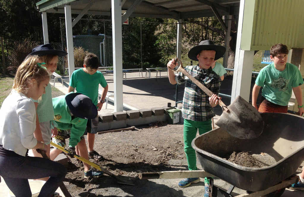 DIGGING IN: Bexhill Primary School students get down and dirty as they create new gardens on National Tree Day DIGGING IN: Bexhill Primary School students get down and dirty as they create new gardens on National Tree Day