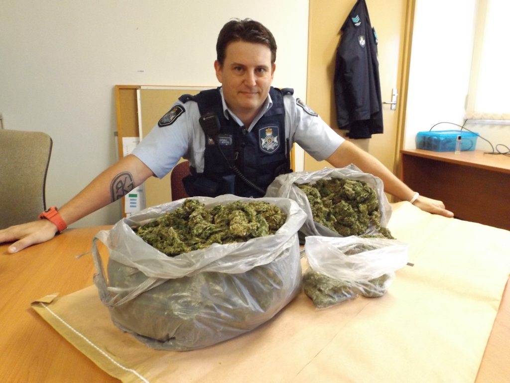 Constable Jamie Griffiths from the Wide Bay Tactical Crime Squad was one of two officers who allegedly found this kilo of cannabis in a vehicle on the Bruce Hwy. Constable Jamie Griffiths from the Wide Bay Tactical Crime Squad was one of two officers who allegedly found this kilo of cannabis in a vehicle on the Bruce Hwy.