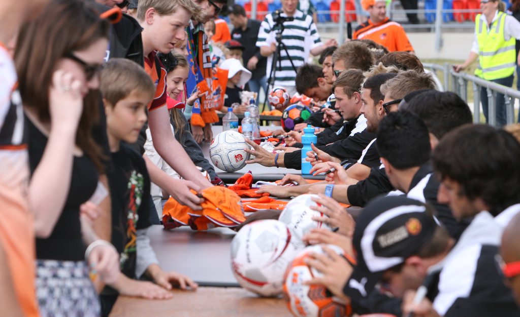 SOCCER MAGIC: Brisbane Roar players sign autographs for Ipswich fans before a match at the North Ipswich Reserve last year. SOCCER MAGIC: Brisbane Roar players sign autographs for Ipswich fans before a match at the North Ipswich Reserve last year.
