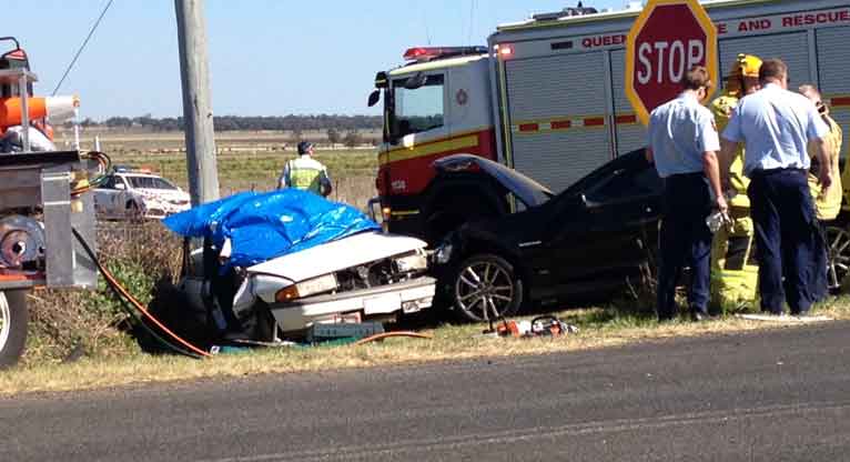 A woman has been killed in this two-vehicle crash west of Toowoomba. A woman has been killed in this two-vehicle crash west of Toowoomba.