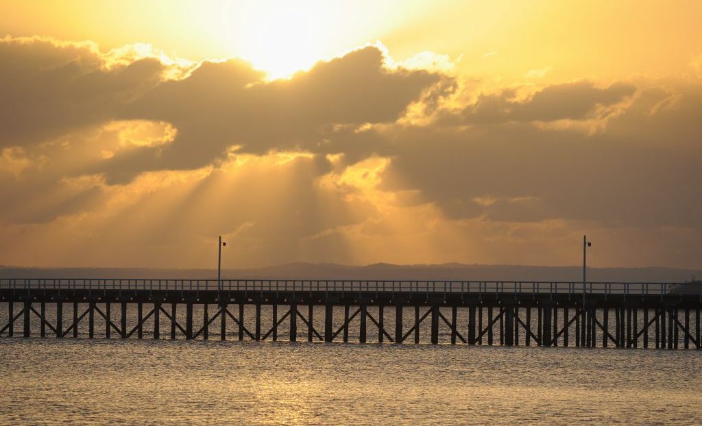 From late last week, a haze of smoke from the island burn has blanketed Hervey Bay. From late last week, a haze of smoke from the island burn has blanketed Hervey Bay.