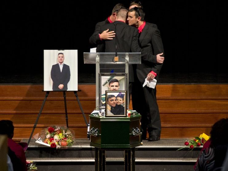 Jeremy Anderson, Mark Duggan, Alex McErlean and Zach Fitzgerald embrace at the funeral of Jaydon Adams. Jeremy Anderson, Mark Duggan, Alex McErlean and Zach Fitzgerald embrace at the funeral of Jaydon Adams.