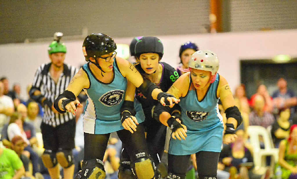 DERBY ACTION: The Harbour City Hustlers versus Townsville Roller Derby Super Villains Roller Derby bout. DERBY ACTION: The Harbour City Hustlers versus Townsville Roller Derby Super Villains Roller Derby bout.