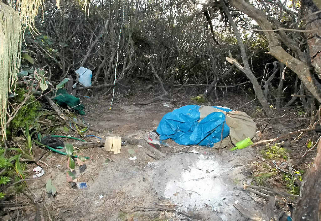 IN THE THICK OF IT: The campsite occupied by two men in the dunes at Marcoola. IN THE THICK OF IT: The campsite occupied by two men in the dunes at Marcoola.
