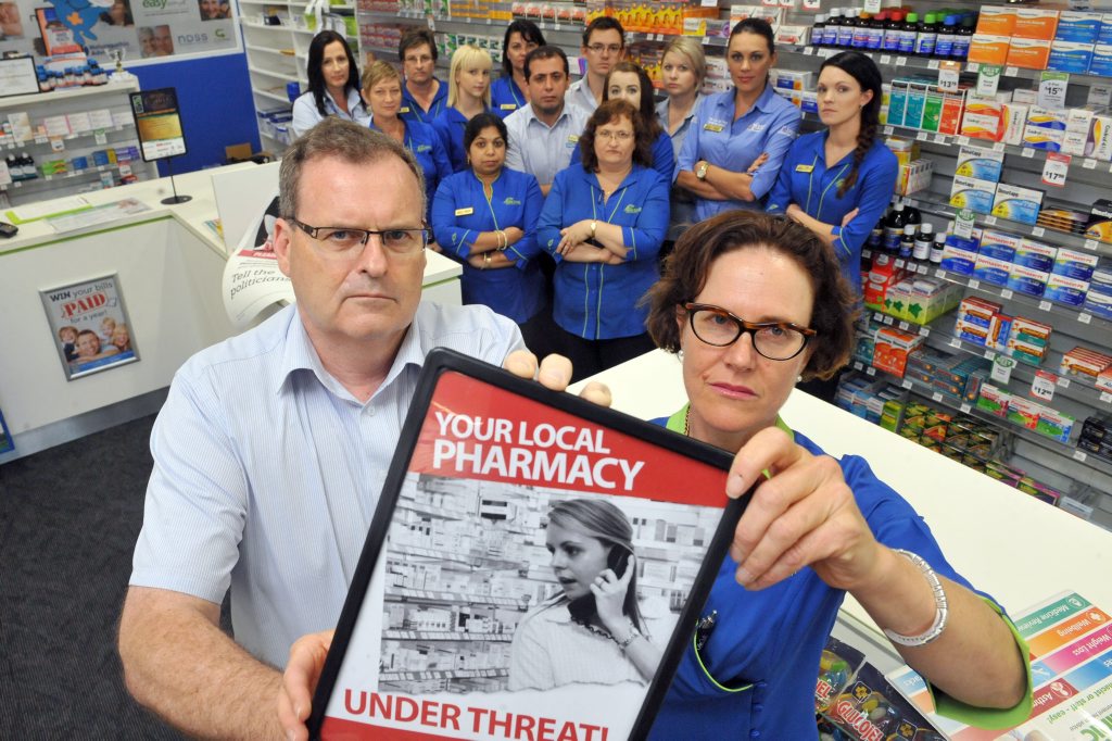 BACKPEDAL: Coral Coast Pharmacy owners David Holmes and Annabelle Hirst are angry and concerned with the Federal Governments move which dishonours the Fifth Community Pharmacy Agreement. Photo: Max Fleet / NewsMail BACKPEDAL: Coral Coast Pharmacy owners David Holmes and Annabelle Hirst are angry and concerned with the Federal Governments move which dishonours the Fifth Community Pharmacy Agreement. Photo: Max Fleet / NewsMail